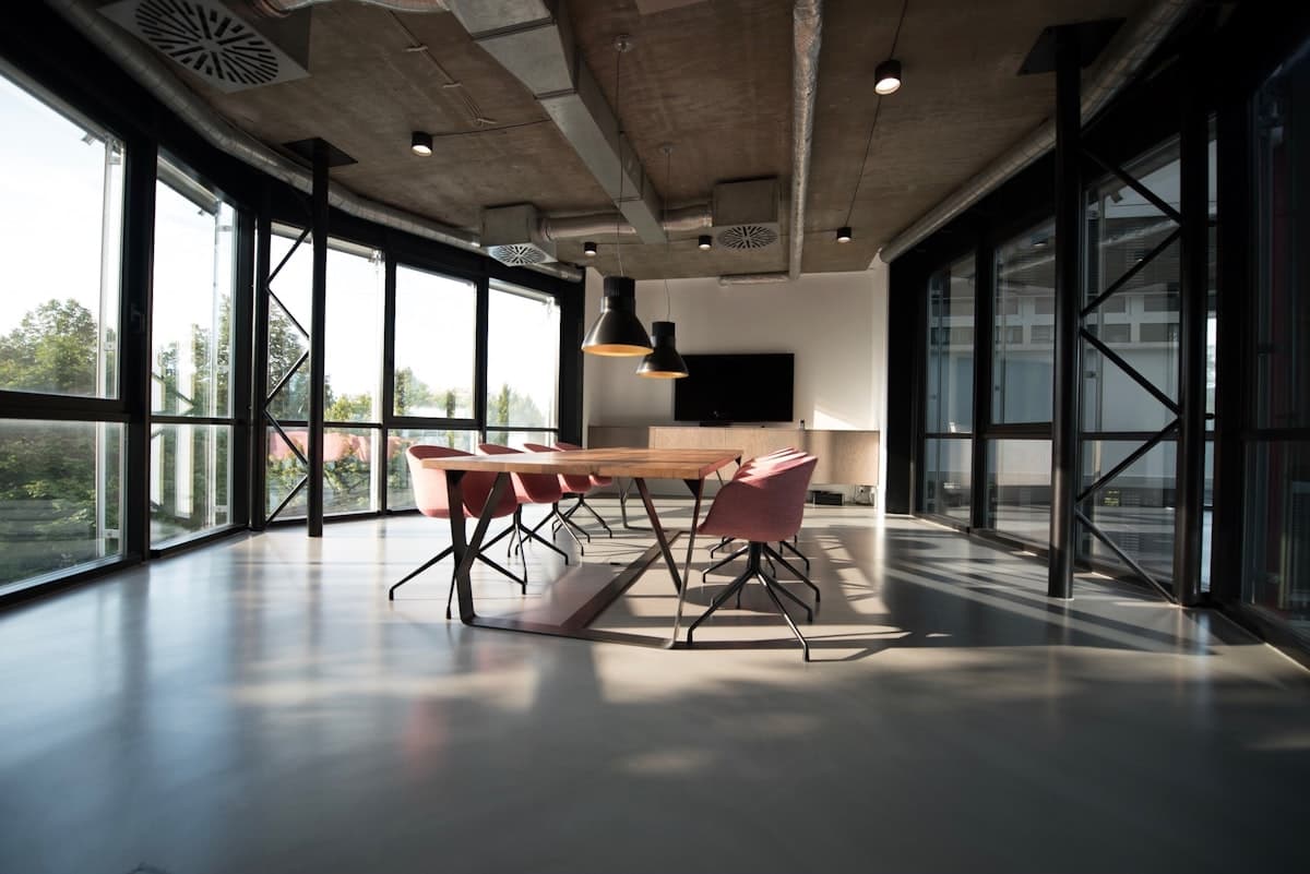 Bright modern corporate office interior with glass walls